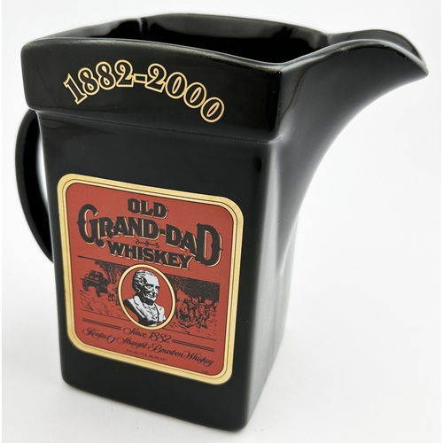 52 - OLD GRAND-DAD WHISKY PUB JUG. 6ins tall. Black square bodied form, black red & gold transfer each si... 