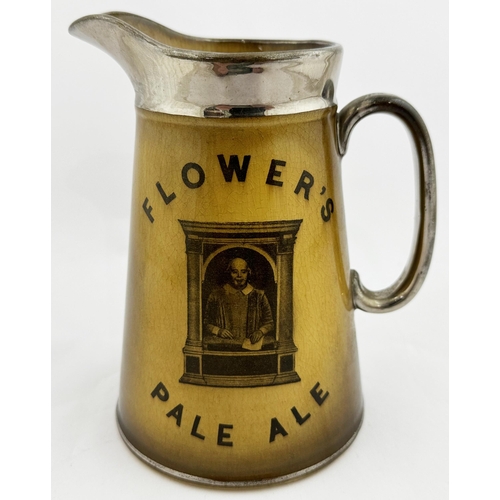 76 - FLOWERS PALE ALE WATER JUG. 6.6ins tall. Creamy body at palest through to darl brown around edges, s... 