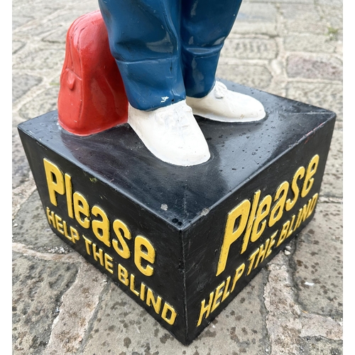 82 - HELP THE BLIND DONATION BOX FIGURE. 42ins tall. Full standing figure h olding box - slot in top. NR.