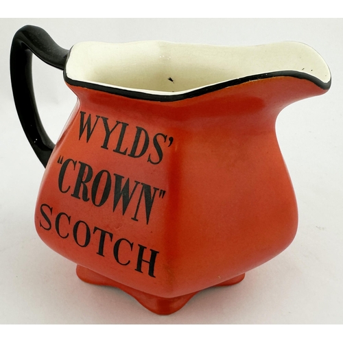 90 - GEORGES BEERS & WYLDS CROWN SCOTCH WATER JUG. 4.1ins tall. Shapely red-orange body, black lettering ... 