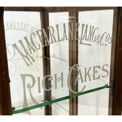 148 - MACFARLANE LANG & COS RICH CAKES SHOP DISPLAY CABINET. 19.75 x 13.5 x 29ins. Two glass shelves insid... 