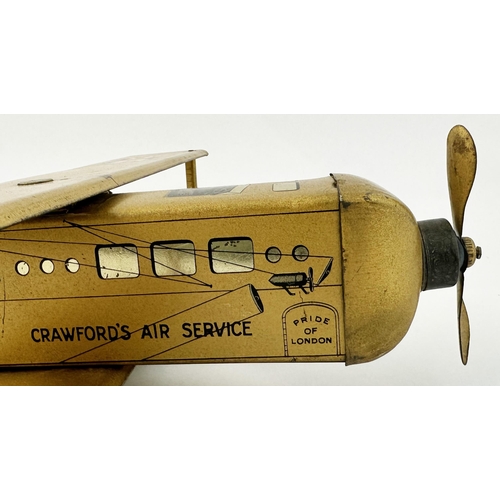 158 - CRAWFORDS AIR SERVICE BI PLANE. 15.6 x 14 x 3.3ins. Large gold coloured bi plane - wings fold in for... 