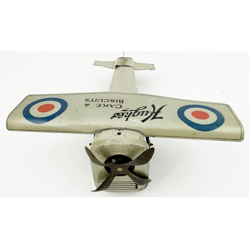 160 - HUGHES CAKES & BISCUITS AEROPLANE. 9.2 x 8 x 3ins. A wonderful period propellor driven silve bi plan... 