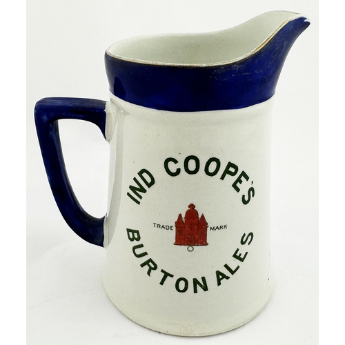 172 - IND COOPES BURTON ALES PUB JUG. 5.6ins tall, protruding lip, rear handle, top deep blue (some wear),... 