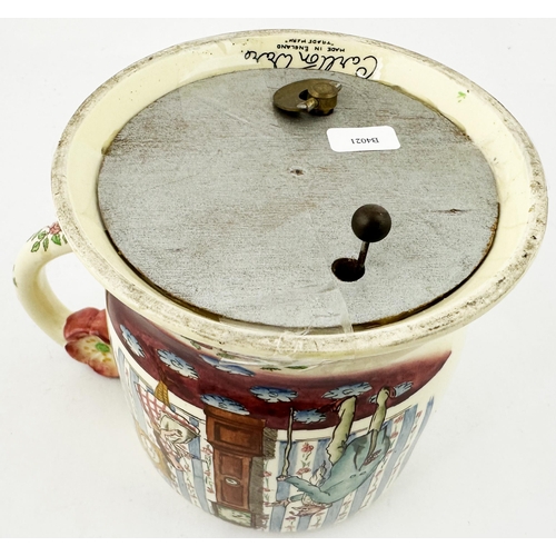 206 - GUINNESS MUSICAL TANKARD. 5ins tall. Multi coloured household interior image to front, Guinness poem... 