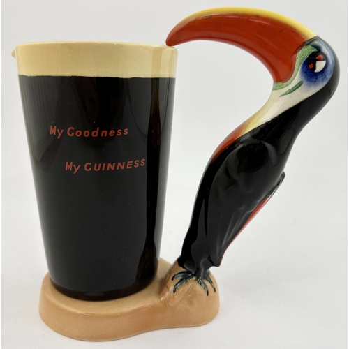 208 - GUINNESS TOUCAN & GLASS BAR TOP FIGURE. 7.2ins tall. Multi coloured toucan supping from large, lette... 