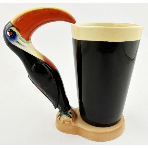 208 - GUINNESS TOUCAN & GLASS BAR TOP FIGURE. 7.2ins tall. Multi coloured toucan supping from large, lette... 