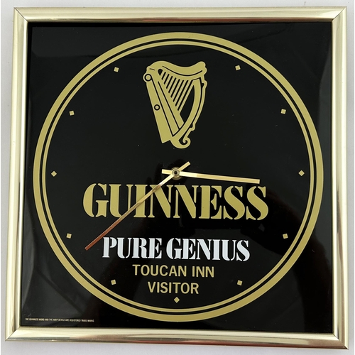 220 - GUINNESS PURE GENIUS WALL CLOCK. 12.7ins square. Battery operated perspex/ plastic wall hanging cloc... 