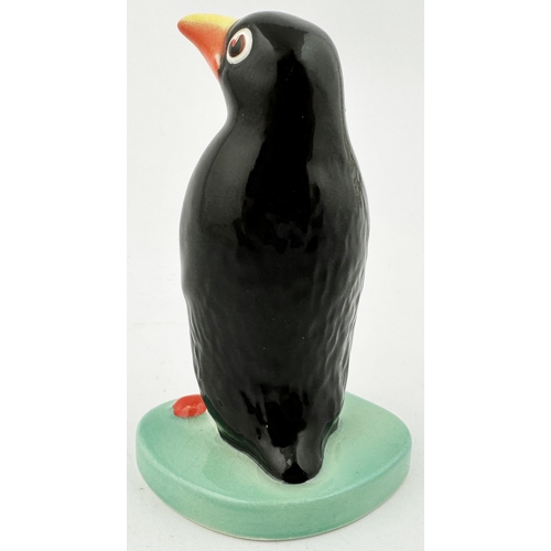 222 - GUINNESS PENGUIN FIGURE. 3.7ins tall. Naturalistically coloured penguin, DRAUGHT GUINNESS on blue ov... 