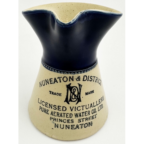 225 - NUNEATON DISTRICT LICENSED VICTUALLERS PUB JUG. 5.3ins tall, pouring lip, rear handle. Waisted stone... 