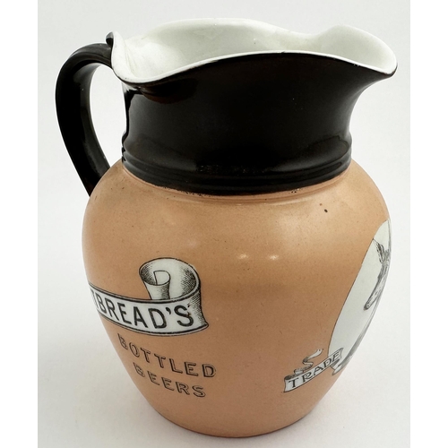 228 - WHITBREADS BOTTLED BEERS PUB JUG. 6.1ins tall. Shapely waisted jug, top dark brown (minor rear glaze... 