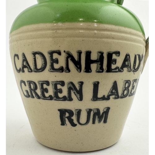 237 - CADENHEAD GREEN LABEL RUM WATER JUG. 5.2ins tall, heavy stoneware. Bright green top, handle, shoulde... 