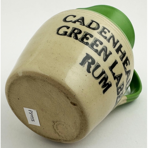 237 - CADENHEAD GREEN LABEL RUM WATER JUG. 5.2ins tall, heavy stoneware. Bright green top, handle, shoulde... 