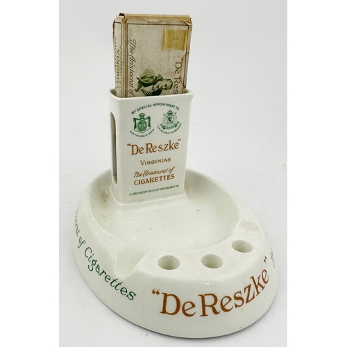 252 - DE RESZKE MATCHBOX HOLDER & ASHTRAY. 6.3 x 4.7ins oval base, 3.6ins tall (not including packet).Off ... 