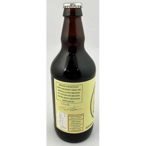 275 - THE BIG SHEEP ABBOTSFORD DEVON H.M.S. MONTAGU BOTTLE OF BEER. 8.9ins tall 500ml full & sealed bottle... 