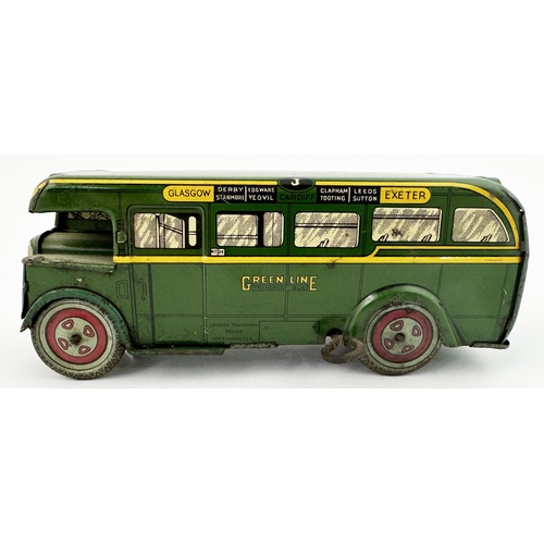 282 - GREEN LINE TIN PLATE SINGLE DECK WIND UP BUS. 7.1 x 2.2 x 2.7. Wonderful period single decker bus in... 