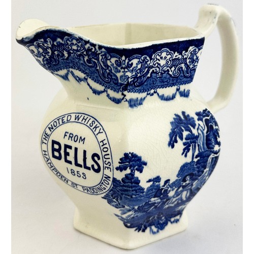 273 - THE NOTED WHISKY HOUSE FROM BELLS 1853 WATER JUG. 5.7ins tall. Unusual & impressive hexagonal ornate... 