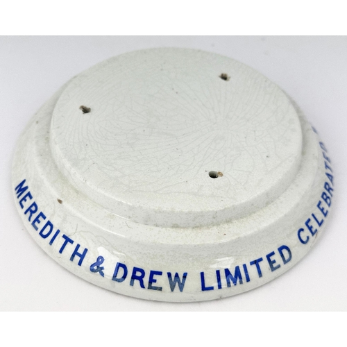 13 - MEREDITH & DREW DISPLAY CAKE STAND. 7.3ins diam. Bright blue writing around the edge MEREDITH & DREW... 