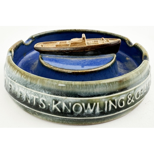 132 - CLEMENTS KNOWLING & CO LTD TUG BOAT ASHTRAY. 5ins diam. Doulton artware example with bright blue cen... 