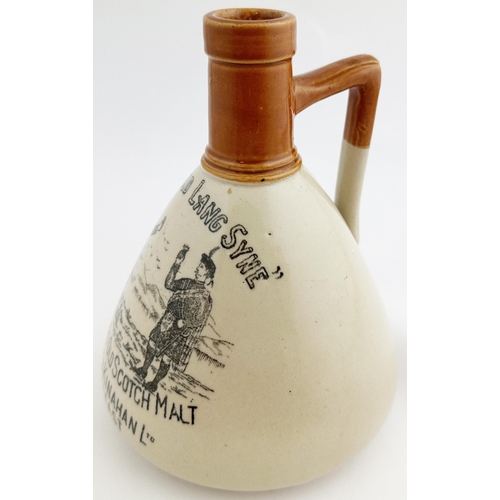 137 - BELFAST KINAHANS WHISKY JUG. (WG p115). 7.4ins tall. A uniquely shaped tapering jug, orange brown to... 