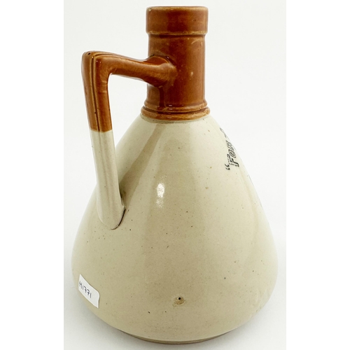 137 - BELFAST KINAHANS WHISKY JUG. (WG p115). 7.4ins tall. A uniquely shaped tapering jug, orange brown to... 