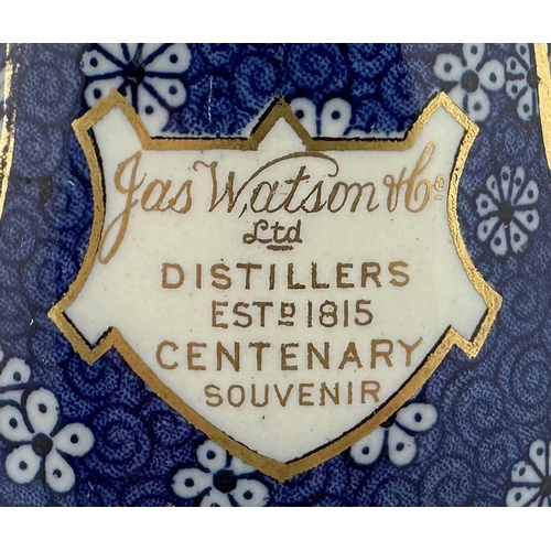 139 - JAS WATSON CENTENARY WHISKY DECANTER. 11.7ins tall. Attractive blue & white ornately decorated pear ... 