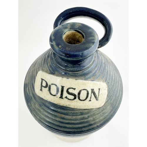 2 - STONEWARE POISON FLAGON. (DP p73). 13.4ins tall. Heavy stoneware cork closure flagon covered in hori... 