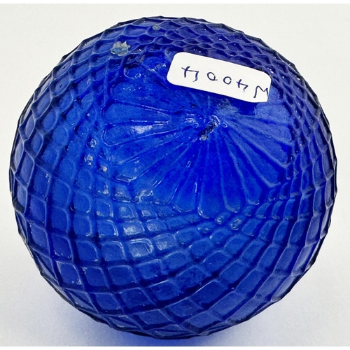 25 - SHOOTING MAN TARGET BALL. 2.9ins tall. Cobalt blue glass, diamond mesh embossing, shooting man picto... 