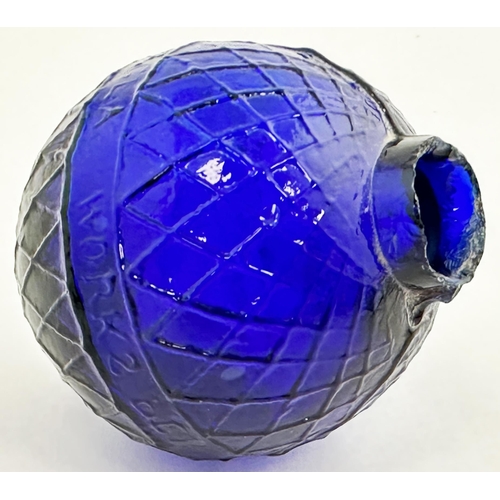 27 - N B PERTH GLASS WORKS TARGET BALL. 2.9ins tall. Deep cobalt blue glass. Diamond lattice body, letter... 