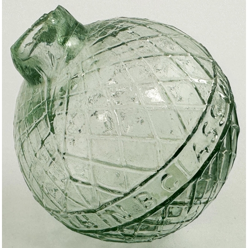 28 - N B PERTH GLASS WORKS TARGET BALL. 3ins tall. Deep aqua glass. Diamond lattice body, heavily embosse... 