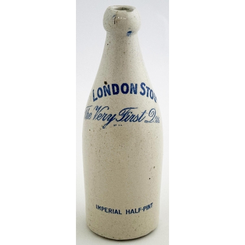 32 - LONDON STOUT THE HORSE SHOE GINGER BEER BOTTLE. 8.2ins tall. All white, ch, cork lip. NR. Blue trans... 