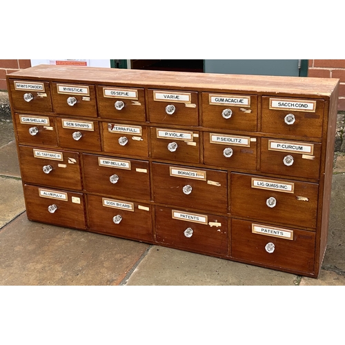 49 - PHARMACY DRUG RUN. 48 x 9 x 25ins (excluding front knobs).Twenty draws wooden construction, fairly c... 