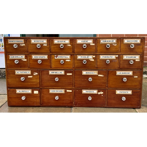 49 - PHARMACY DRUG RUN. 48 x 9 x 25ins (excluding front knobs).Twenty draws wooden construction, fairly c... 