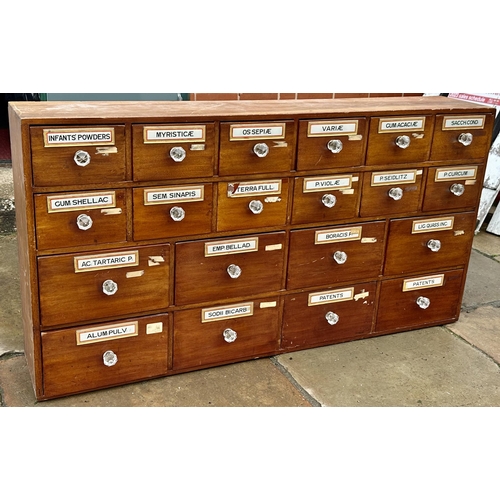 49 - PHARMACY DRUG RUN. 48 x 9 x 25ins (excluding front knobs).Twenty draws wooden construction, fairly c... 