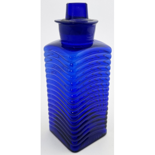 50 - JOHNSON & JORGENSEN POISON BOTTLE. (DP p152, C&D-1). 7.8ins tall. Distinctive raised horizontal wave... 