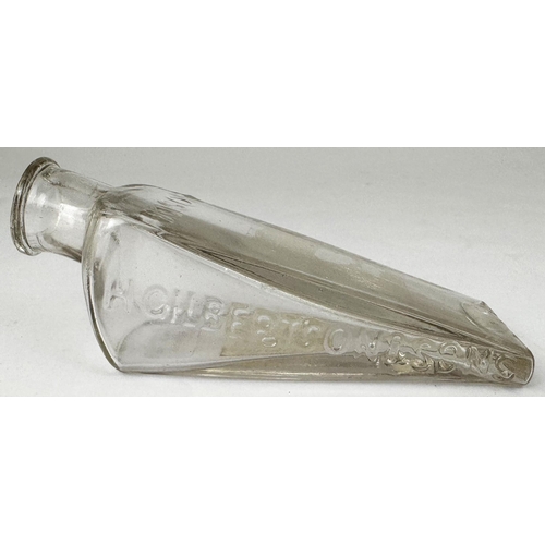 89 - GILBERTSONS WEDGE PATENT POISON BOTTLE. DP p22). Clear lead glass wedge shape. Very heavily & crispl... 