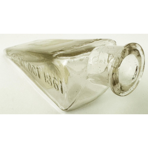 89 - GILBERTSONS WEDGE PATENT POISON BOTTLE. DP p22). Clear lead glass wedge shape. Very heavily & crispl... 