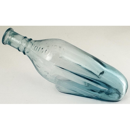 90 - QUINES POISON BOTTLE. (DP p 34) 7.4ins long. Delightful ice blue glass, embossed POISON either side ... 