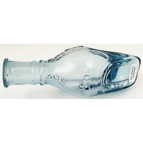 92 - QUINES POISON BOTTLE. (DP p 34) 4.6ins long. Delightful ice blue glass, embossed POISON either side ... 