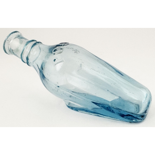 93 - QUINES POISON BOTTLE. (DP p 34) 3.9ins long. Delightful ice blue glass, embossed POISON either side ... 