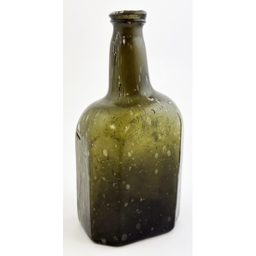 164 - ENGLISH BLACK GLASS OCTAGONAL BODIED WINE STYLE BOTTLE. 7.4ins tall. Black glass/ dark green, short ... 