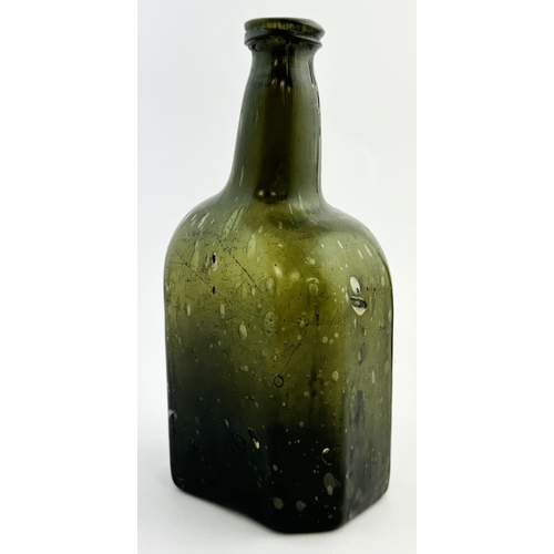 164 - ENGLISH BLACK GLASS OCTAGONAL BODIED WINE STYLE BOTTLE. 7.4ins tall. Black glass/ dark green, short ... 