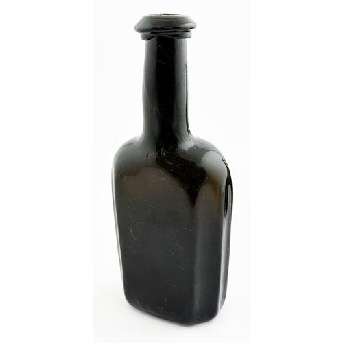 165 - EARLY ENGLISH UTILITY BOTTLE. 8.7ins tall. Extremely dark black glass rectangular form with facetted... 