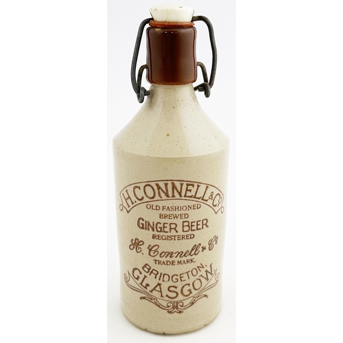 170 - GLASGOW BRIDGETOWN H CONNELL & CO GINGER BEER BOTTLE. 7.9ins tall. Std, dark brown lip, swing stoppe... 