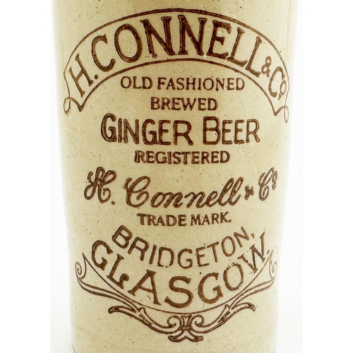 170 - GLASGOW BRIDGETOWN H CONNELL & CO GINGER BEER BOTTLE. 7.9ins tall. Std, dark brown lip, swing stoppe... 