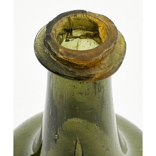 172 - ENGLISH SEALED MALLET WINE BOTTLE. David Burton Vol 3, p1469.. 6.7ins tall. Mid green glass, full of... 