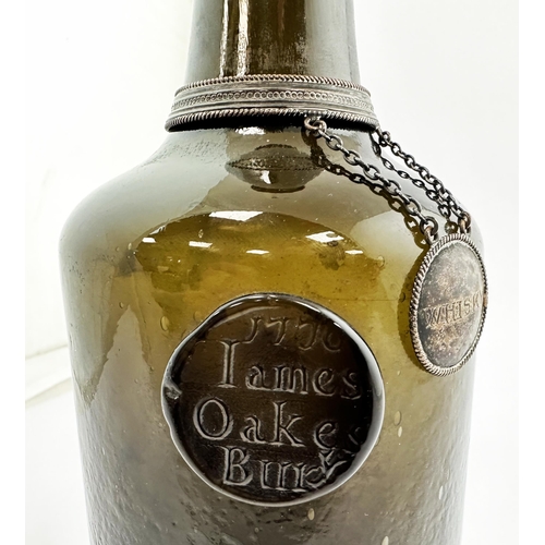 174 - JAMES OAKES BURY 1770 DATED SEALED WINE BOTTLE. David Burton Vol 2, p742. 10.4ins. Black glass class... 