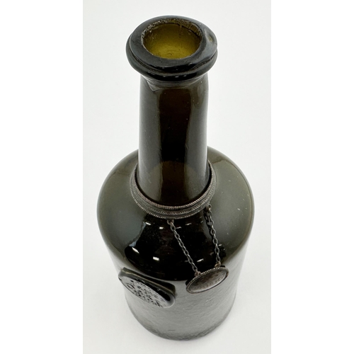 174 - JAMES OAKES BURY 1770 DATED SEALED WINE BOTTLE. David Burton Vol 2, p742. 10.4ins. Black glass class... 