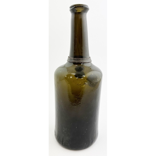 174 - JAMES OAKES BURY 1770 DATED SEALED WINE BOTTLE. David Burton Vol 2, p742. 10.4ins. Black glass class... 