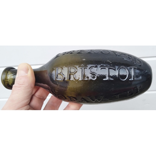 179 - BRISTOL BLACK GLASS EMBOSSED HAMILTON. 7.4ins long. Strong black glass, very dark olive green where ... 